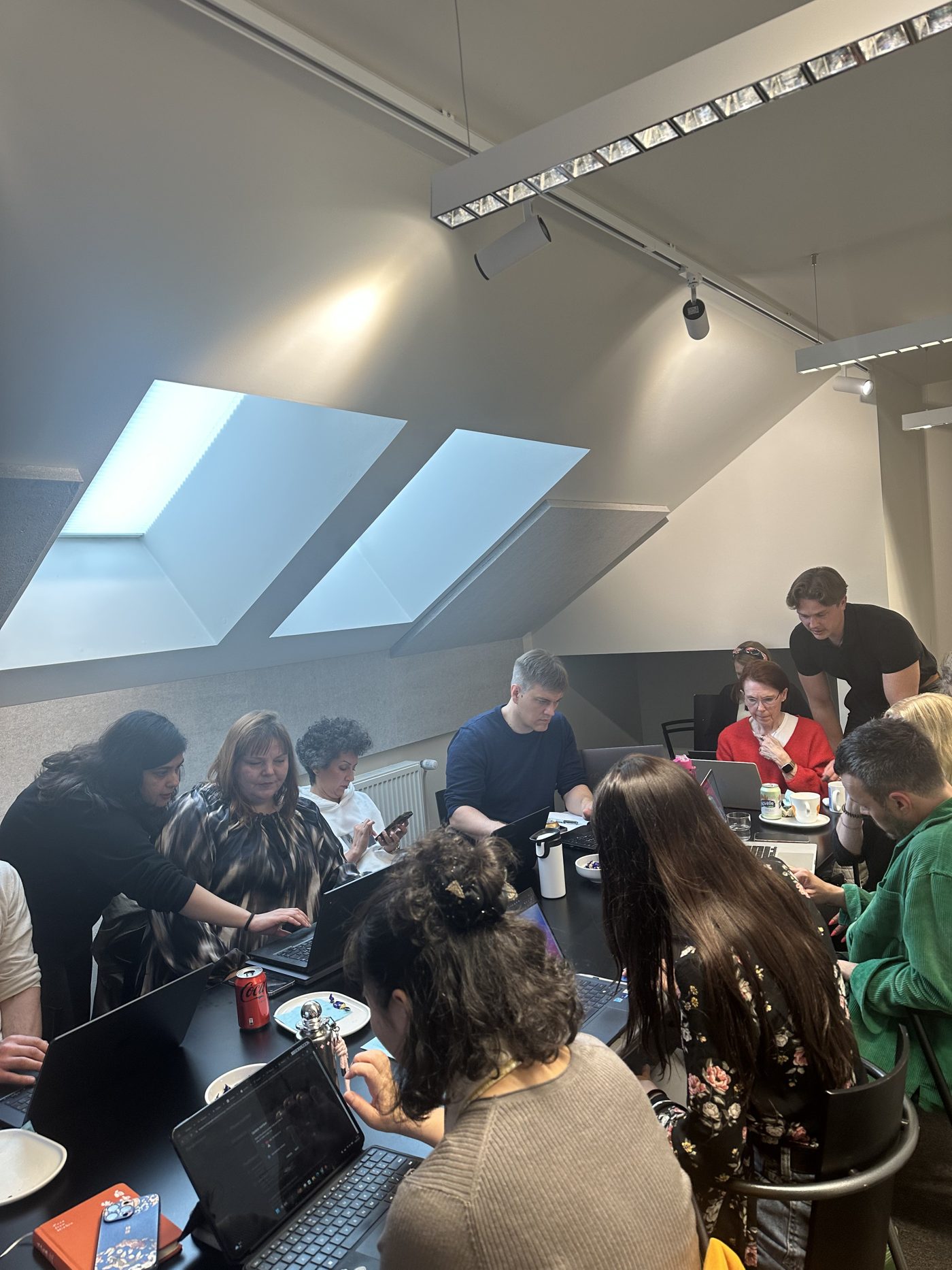 Group of workshop participants collaborating on their projects