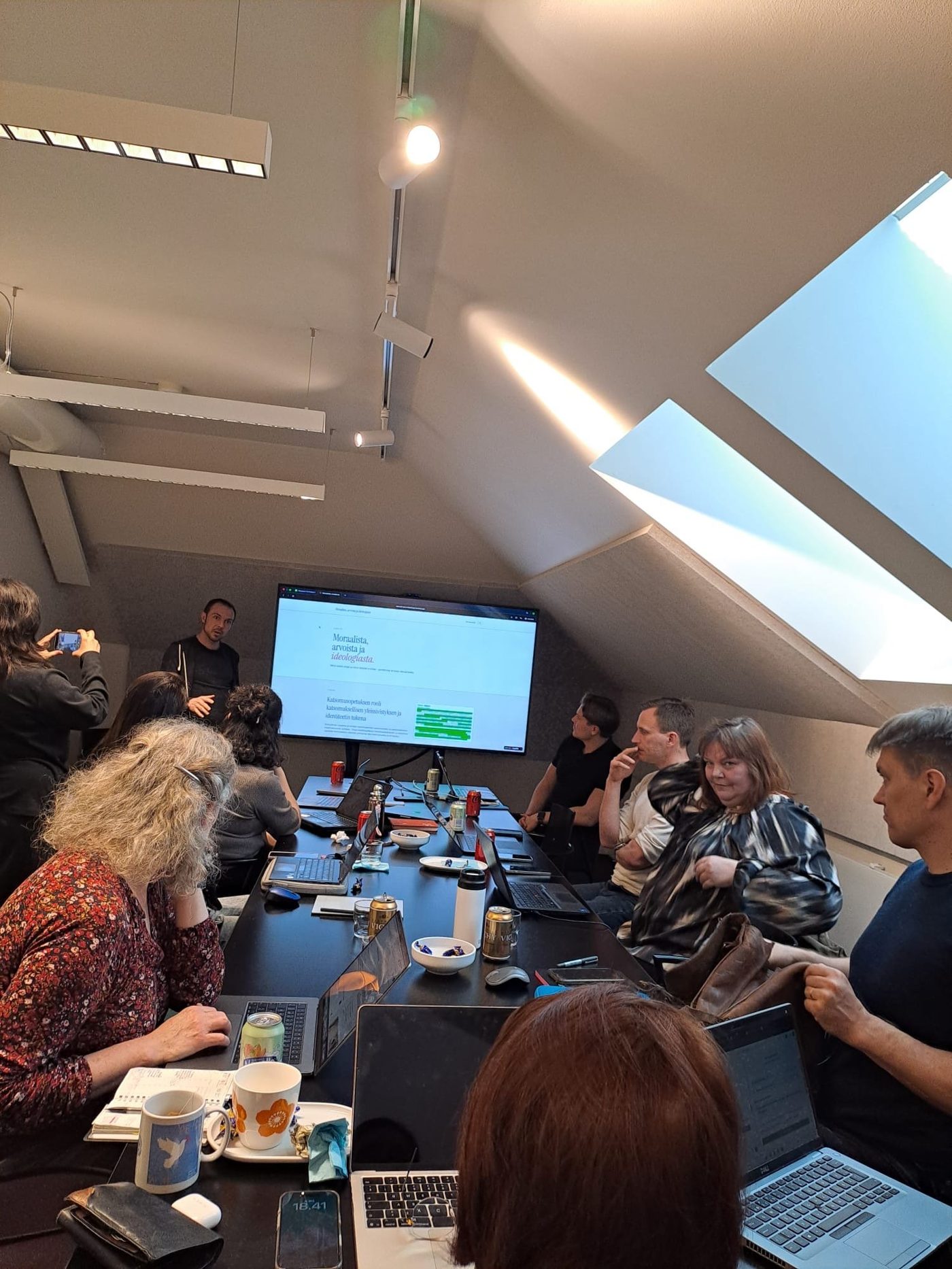 Participants working on laptops during the Vibe Coding workshop at Helsinki Education Hub